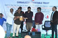 Megastar Distributes Health Cards Photos